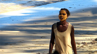 Woman wearing traditional sun-block, Ifaty beach